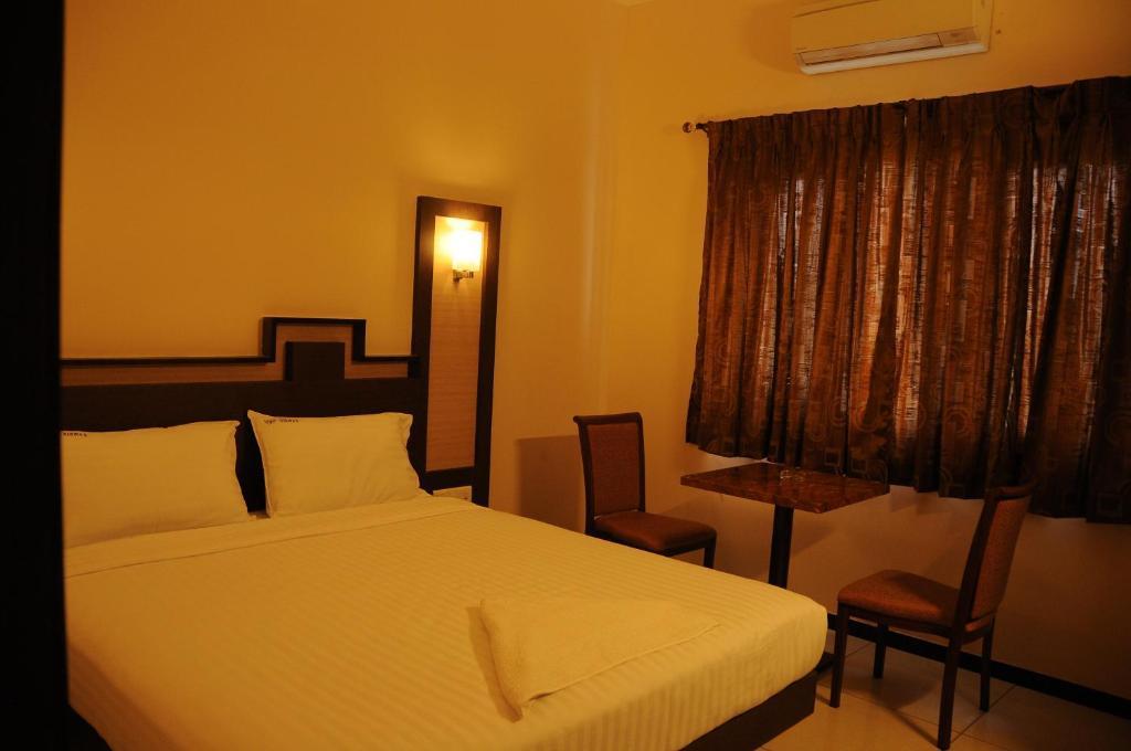 Hotel Viswas Tirupur Szoba fotó